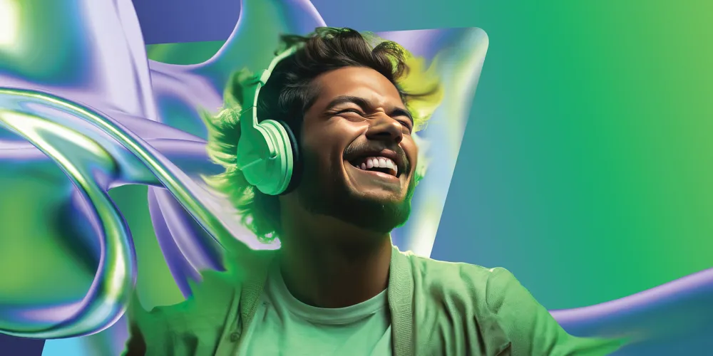 man listening to headphones with green and purple background